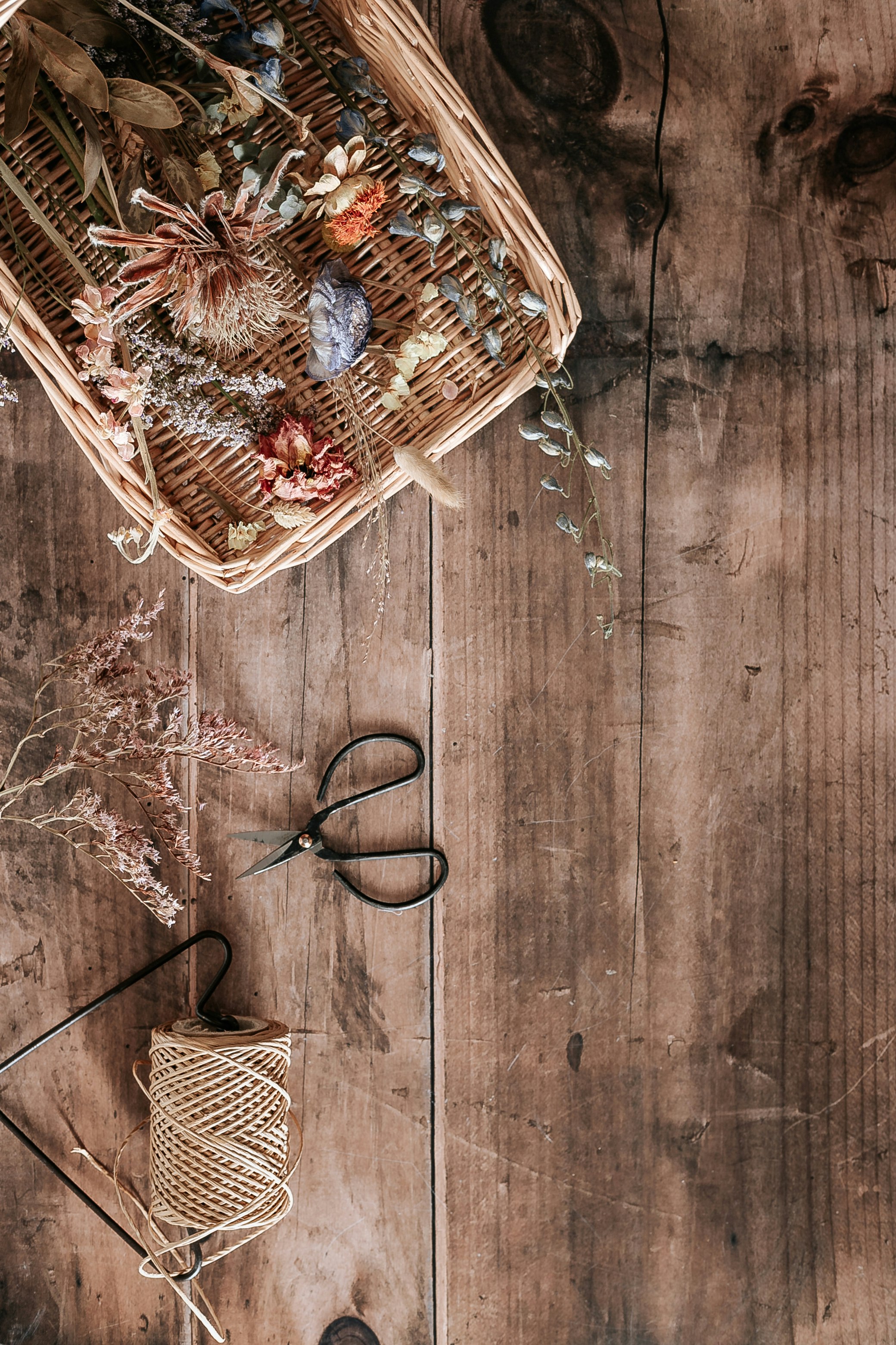 brown woven basket on brown wooden table